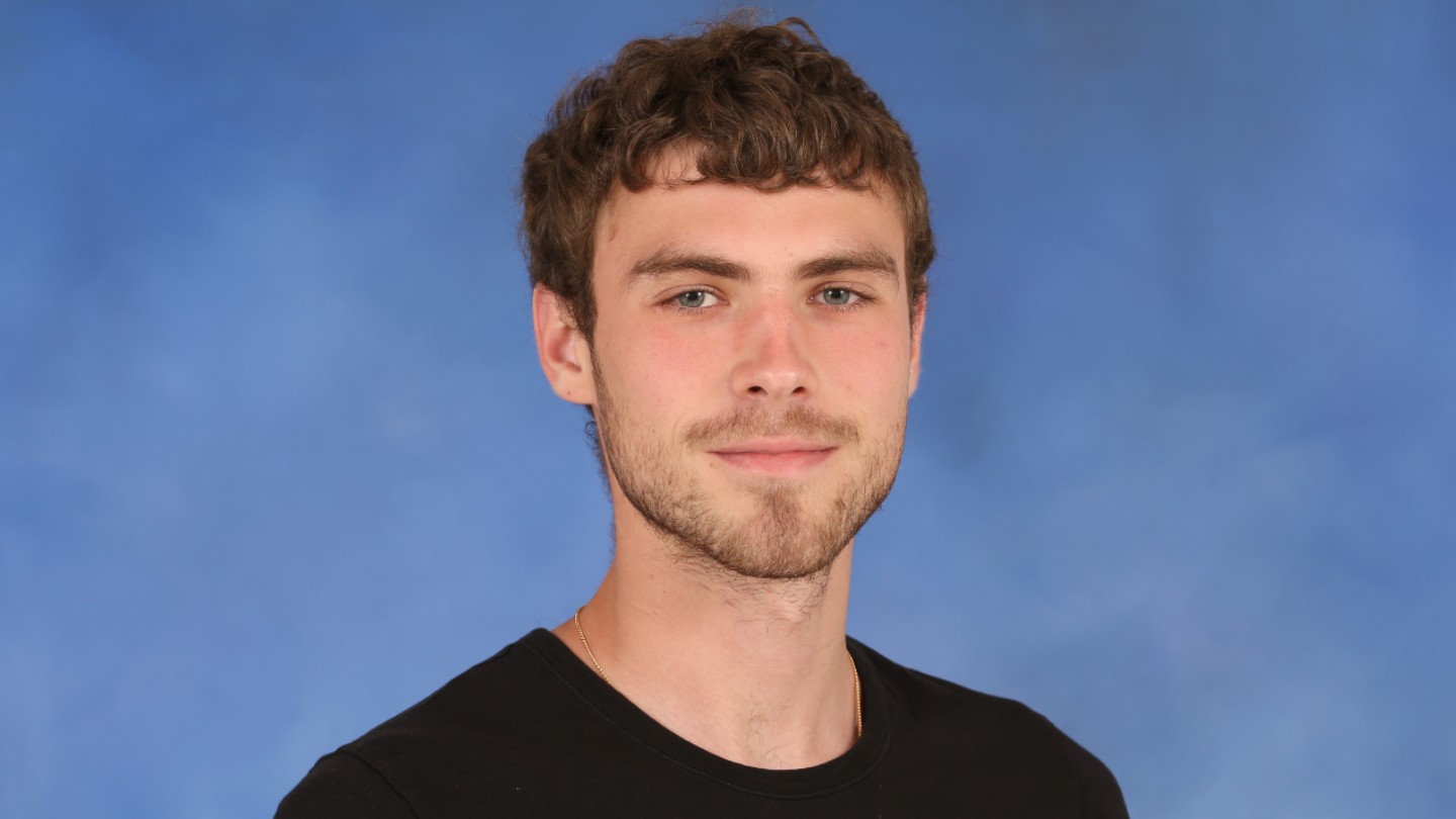 Student overcomes setbacks of war to solve a difficult quantum optical system problem